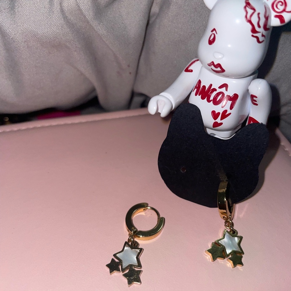 Gold star ⭐️ mother of pearl  Huggies stainless steel earrings